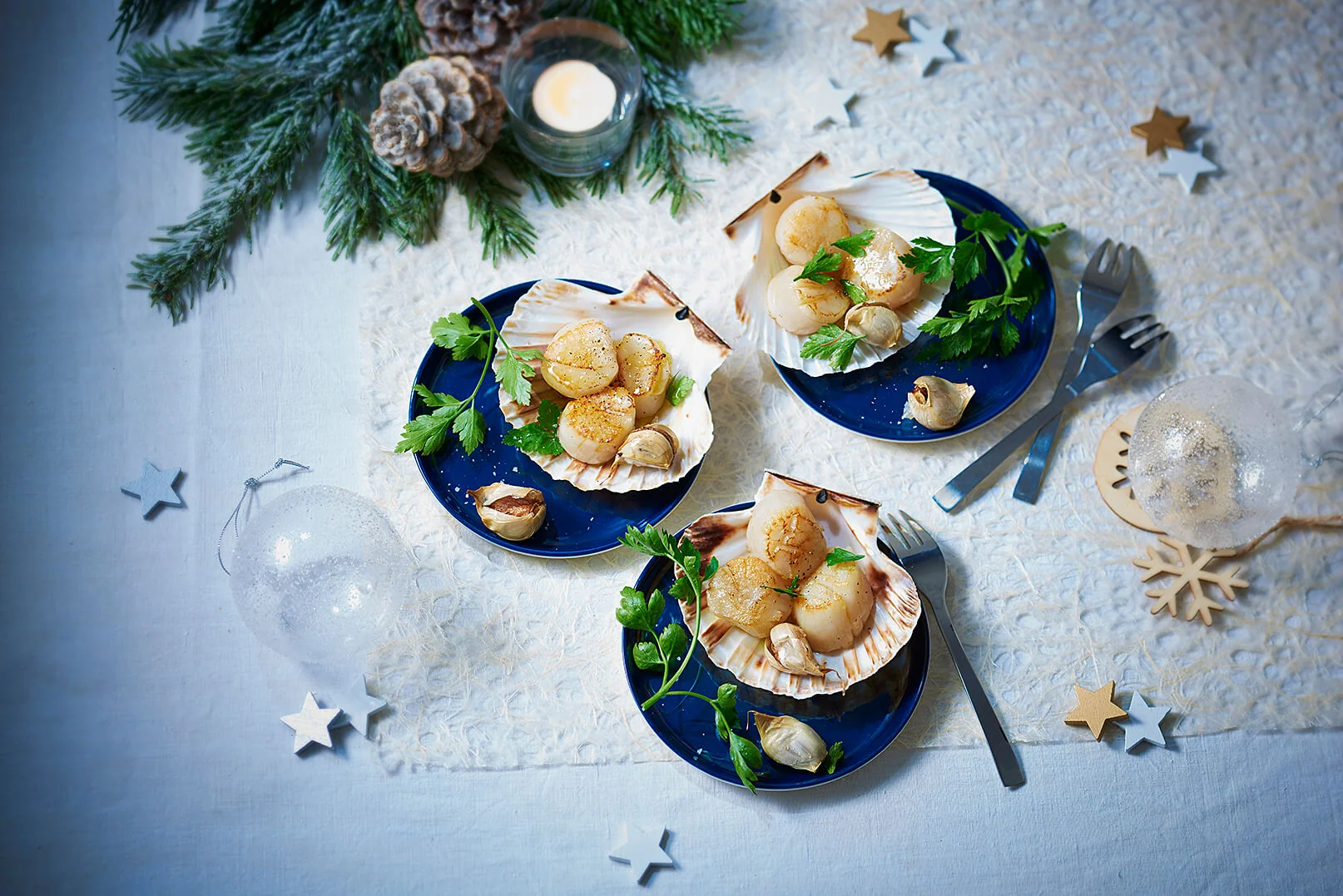 Jakobsmuscheln mit kandiertem Knoblauch und BIO PLANETE Olivenöl fruchtig
